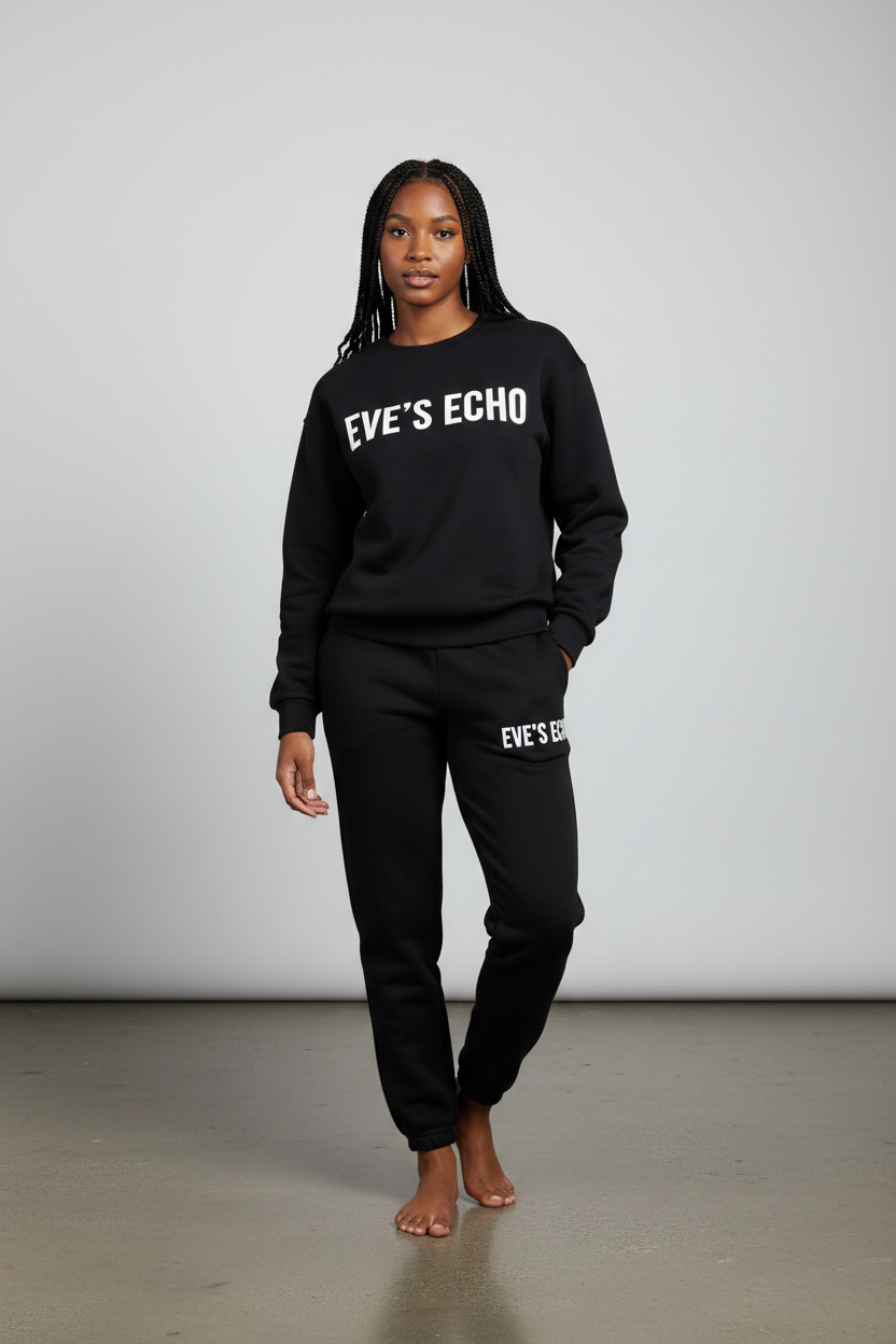 Create an image of a young black woman wearing a black sweatshirt and sweatpants with EVE'S ECHO on the center of the shirt and EVE'S ECHO stacked horizontally on the left pant by the pocket. The font color should be white.